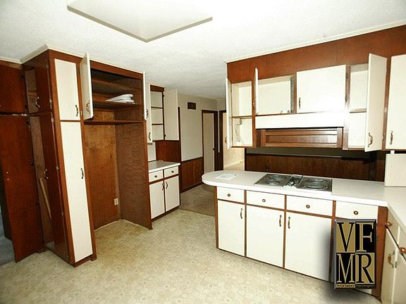 Kitchen view to storage and work station