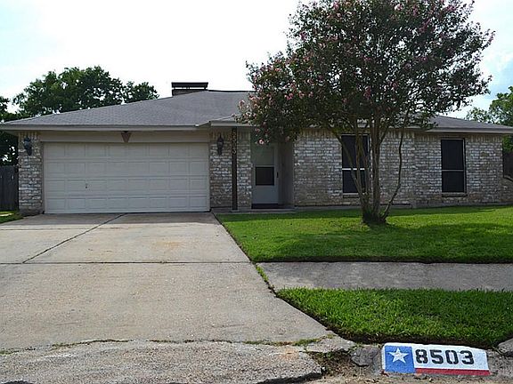  Nice large driveway and a covered entry with storm door.
