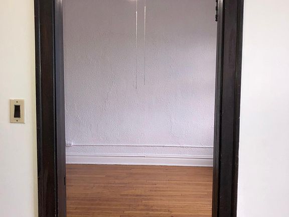 doorway between living room and dining area