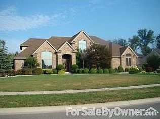 All-Brick Exterior : Professionally landscaped. Irrigation system. Invisible fence.