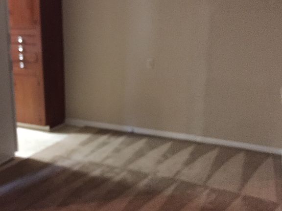 View of dining room from kitchen