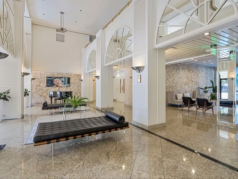 Luxury building's RECEPTION area with 24hr full-service front desk, mailroom & valet (included FREE for tenants)