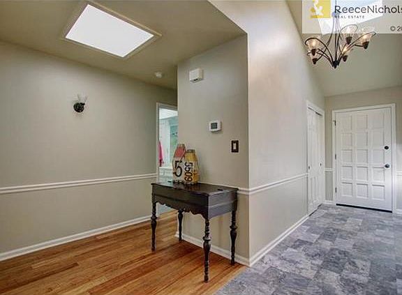 Skylights provide natural light in the front entry hallway.
