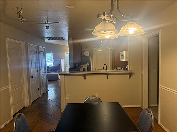 5th image of 401 Poppy Ln