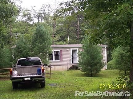 View of home and yard from driveway