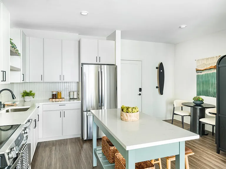Coastal charm meets clean design_this Modera South Shore kitchen brings elevated style to everyday living in Marshfield.