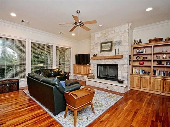 Solid cherry flooring and custom hickory cabinets add warmth to the first floor living spaces.