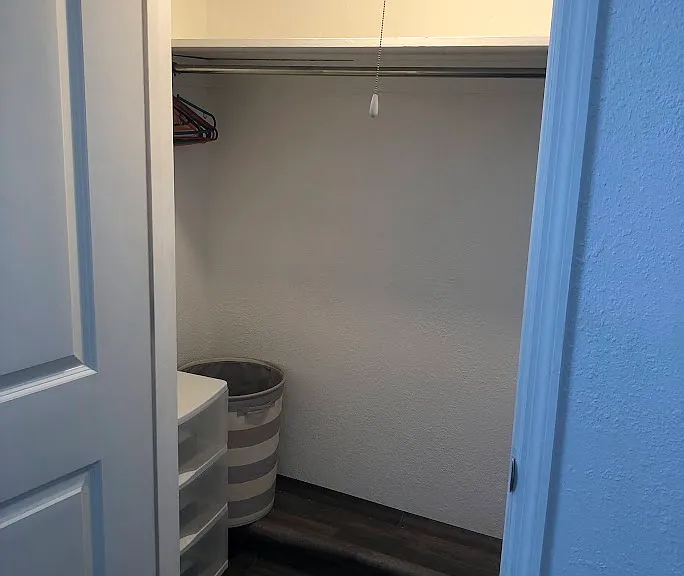 Not-ensuite bedroom closet.