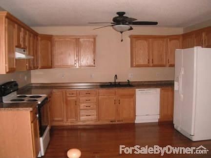Kitchen
						:
						New hardwood floors, counter tops, sink, faucet, hardware, ceiling fan, oak cab.