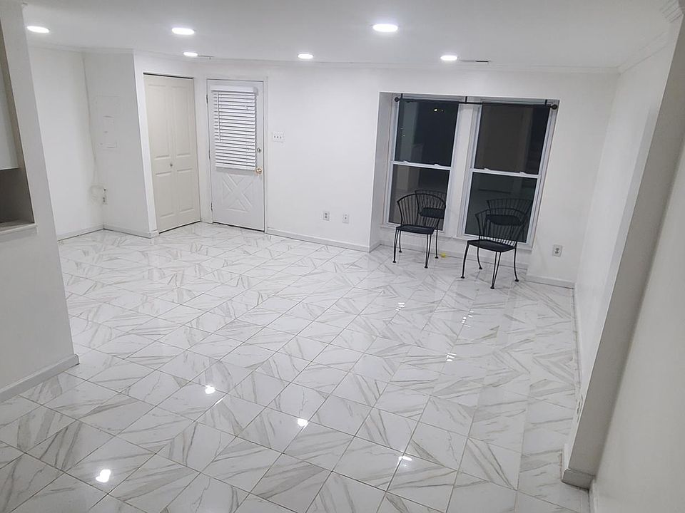 Living room. New floors, New windows and contemporary look.