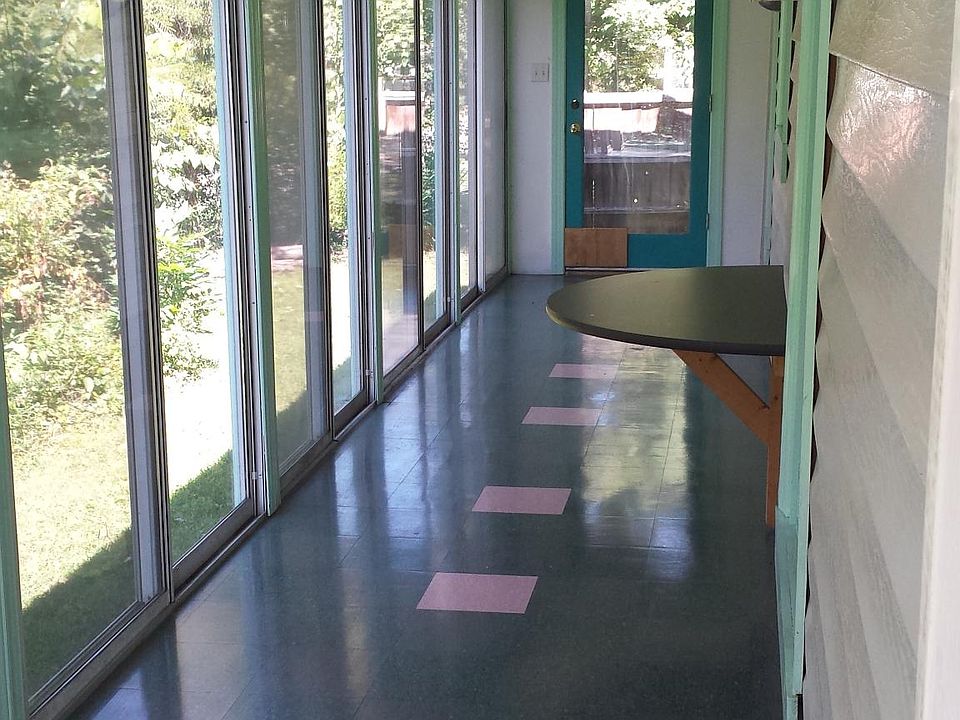 Sun room runs the length of the house