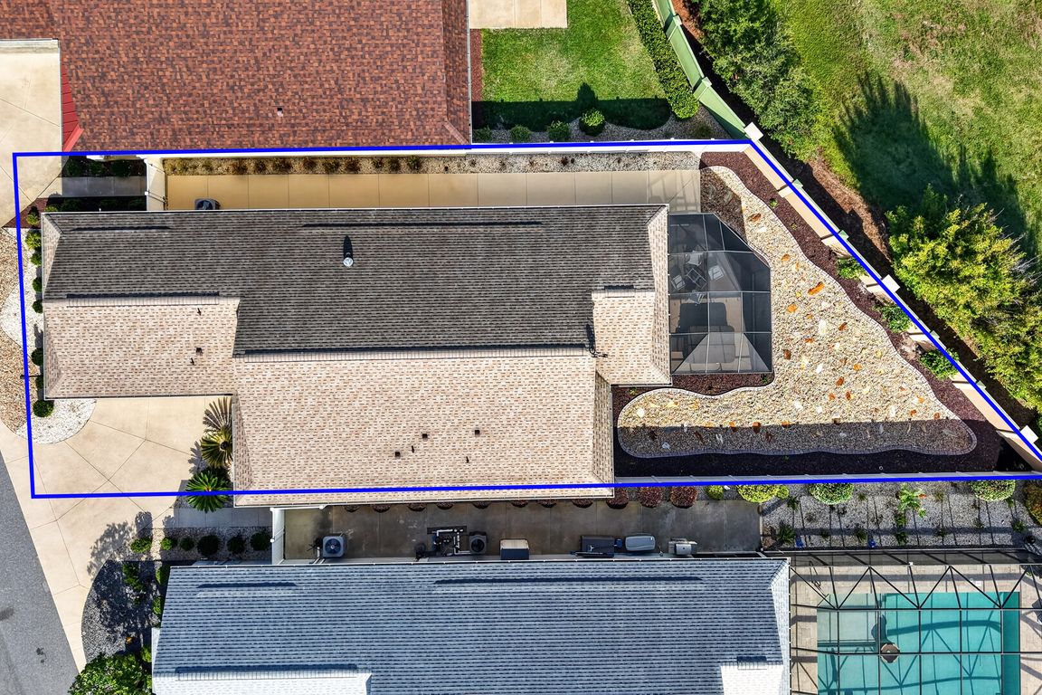 Aerial with Property Lines, Privacy Wall and Fencing, Stoned Landscaping, and ROOM FOR A POOL!