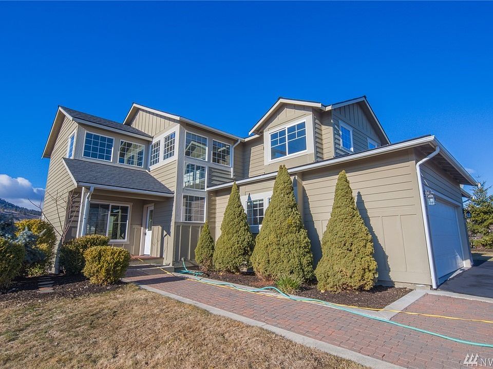 Covered front porch and stone walkway lead to this completely remodeled home.
