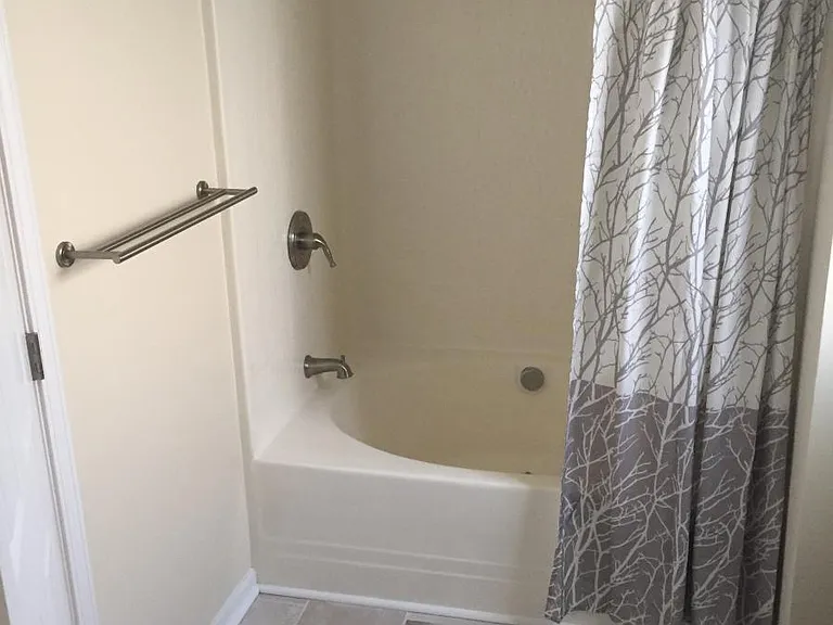 Tiled master bathroom.