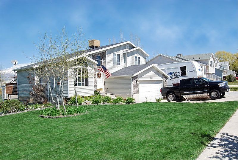 Outside Front of House and RV Parking on Side