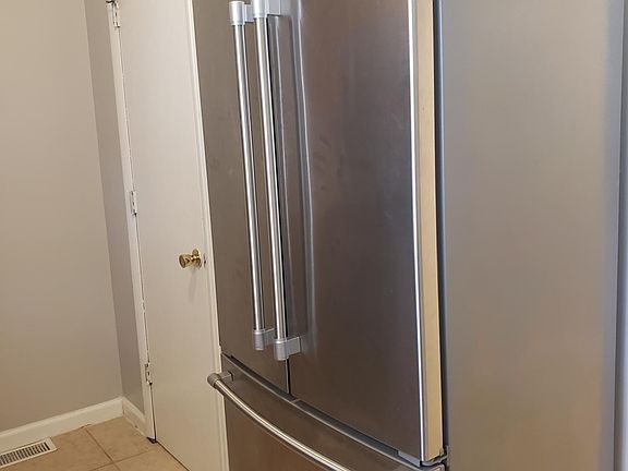 Full sized french door refrigerator included