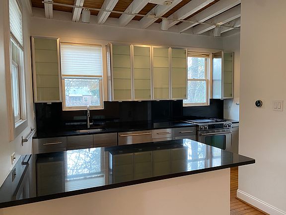 Kitchen with JennAir appliances. Overlooks the backyard.