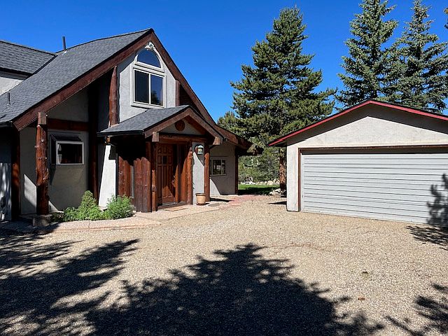 Front of the property with small 2 car garage.