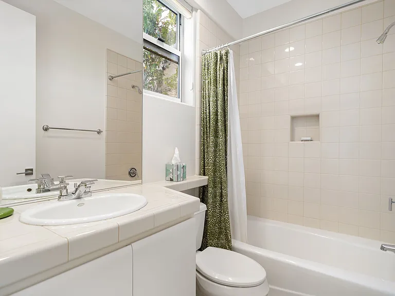Guest bath with tub/shower.