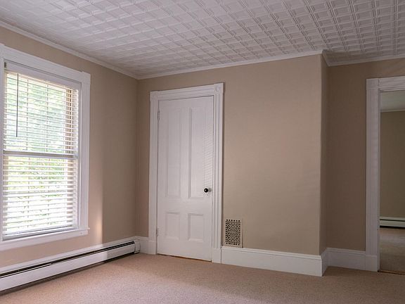 The living room is in the middle of the apartment's second floor... the hub, if you will...