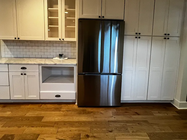 pantry with pull out drawers. new refrigerator with ice maker and interior water dispenser