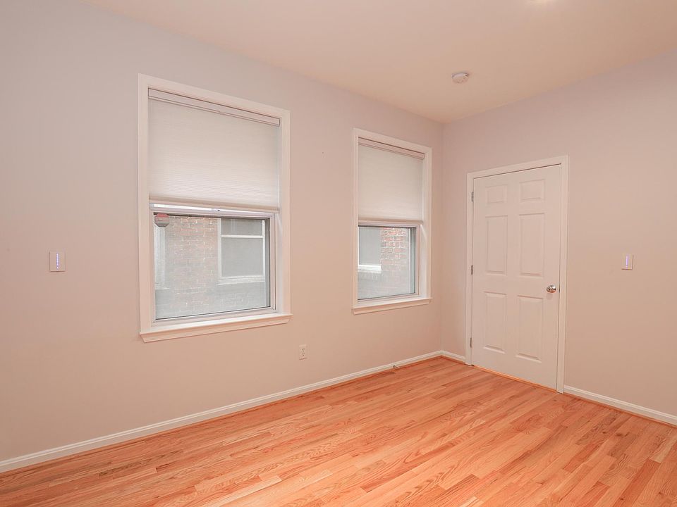 Spacious Bedroom with Hardwood Floors