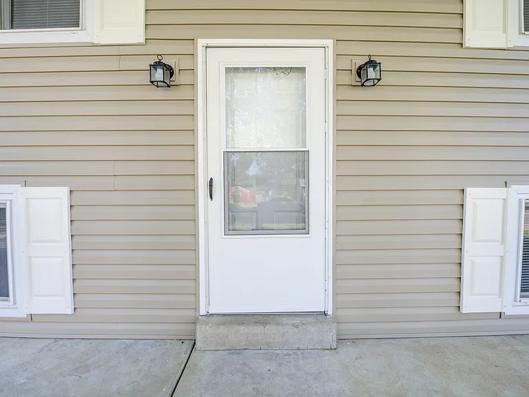 Front door area under the front porch. YOU MUST have a credit score greater than 670 to rent this home!! You must have a credit score greater than 670 to rent this home
