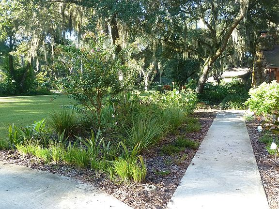 Front garden walk with landscape lighting