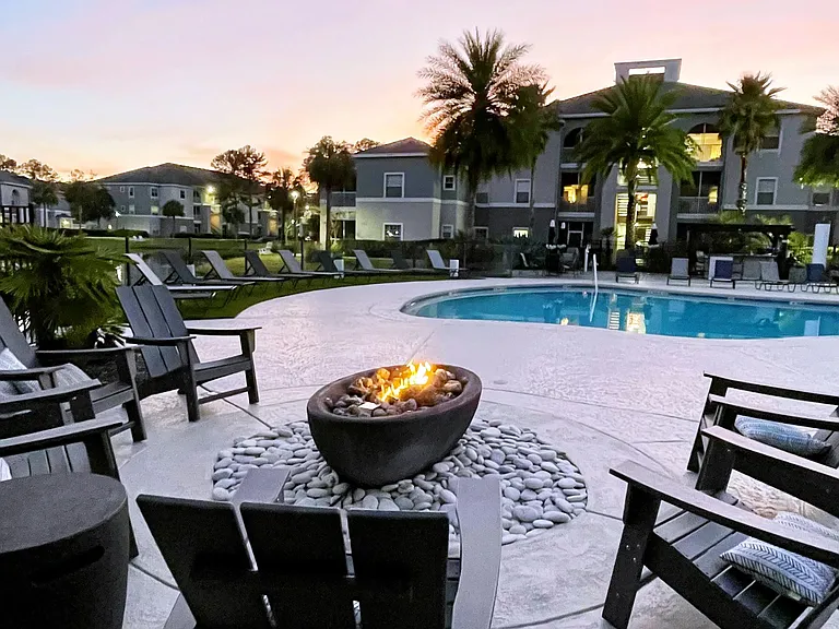Unwind by the fire pit with a stunning sunset view.