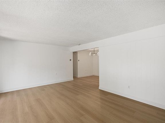 Here is another view of the living room area into the dining room