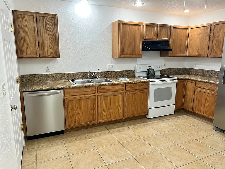 Kitchen with door on left to the Arizona room & new dishwasher