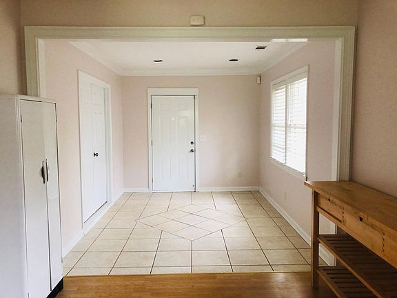 Front entrance and possible office, studio, living room, etc