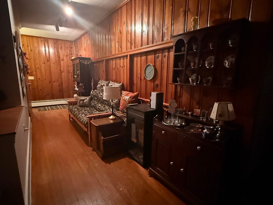 Wide hallway with sofa bed