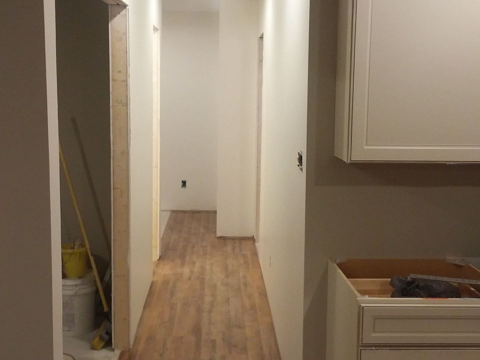 Hallway to LR, bedrooms, and bathrooms