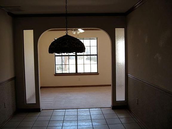 walk through dining room Tiffany inspired chandeler