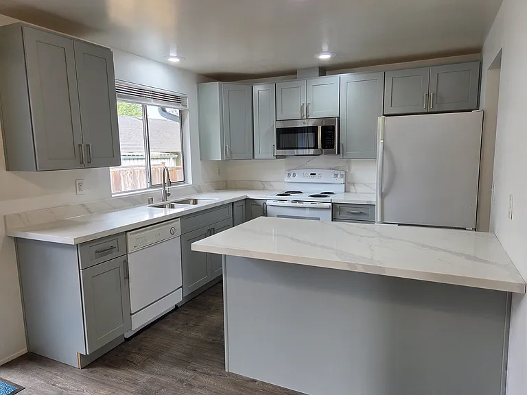 Kitchen with nice island and room for barstools