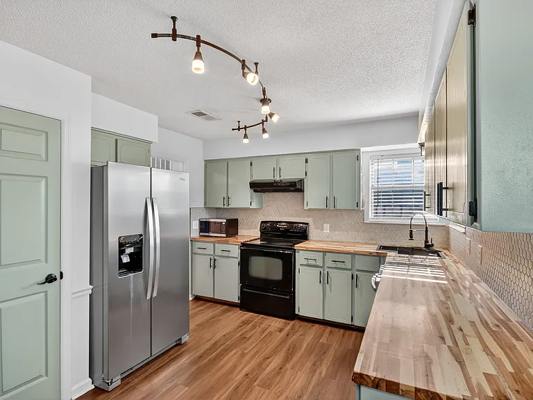 606 Windhaven Dr — Photo 16