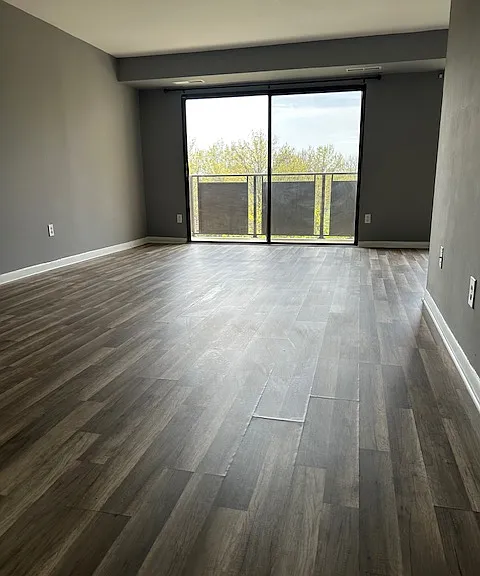 Living room with sliding doors to balcony