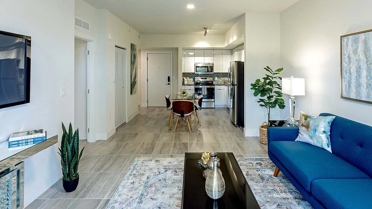 Griffis Pompano Beach apartment living room with wood style floor. - Griffis Pompano Beach
