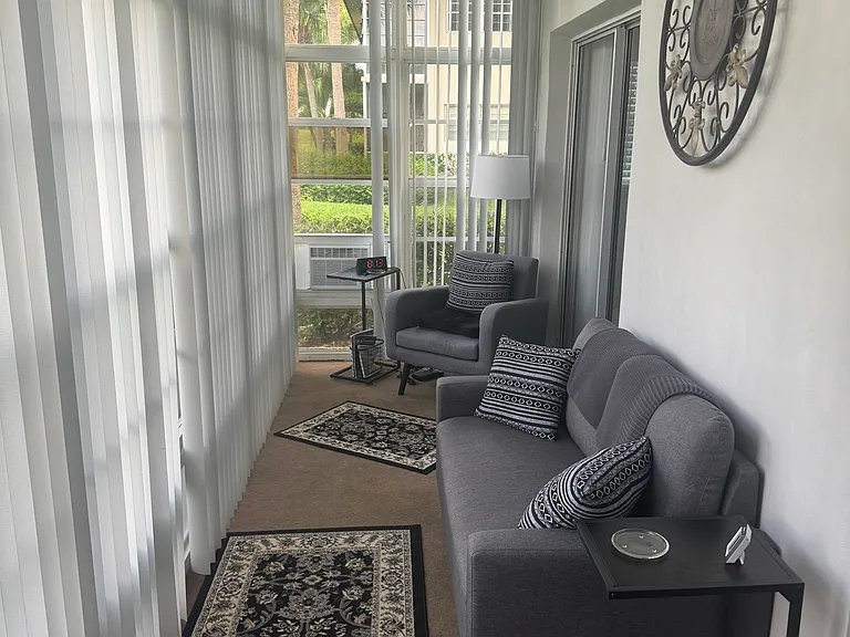 Den with gorgeous outside views.