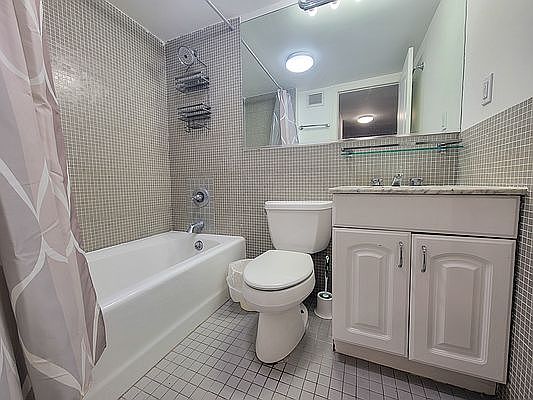 5th image of 344 E 51st St APT 1