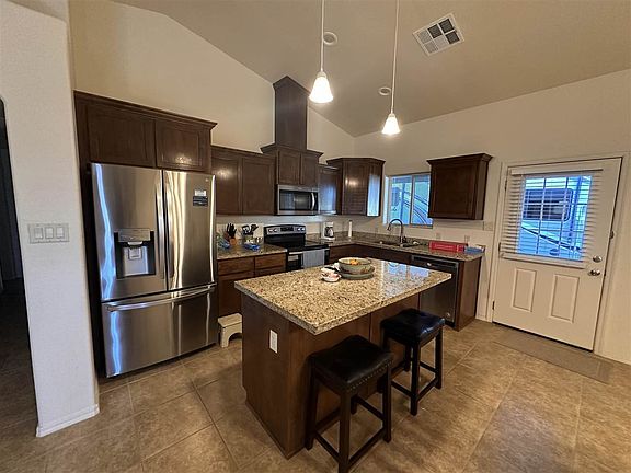 5th image of 13238 E 53rd Dr