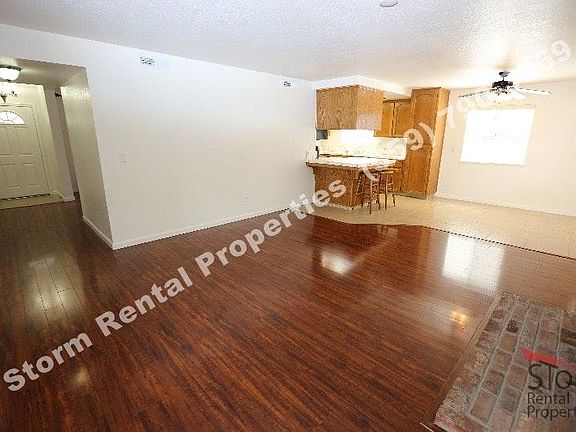 Family Room - Wood burning fire place. Good view from kitc