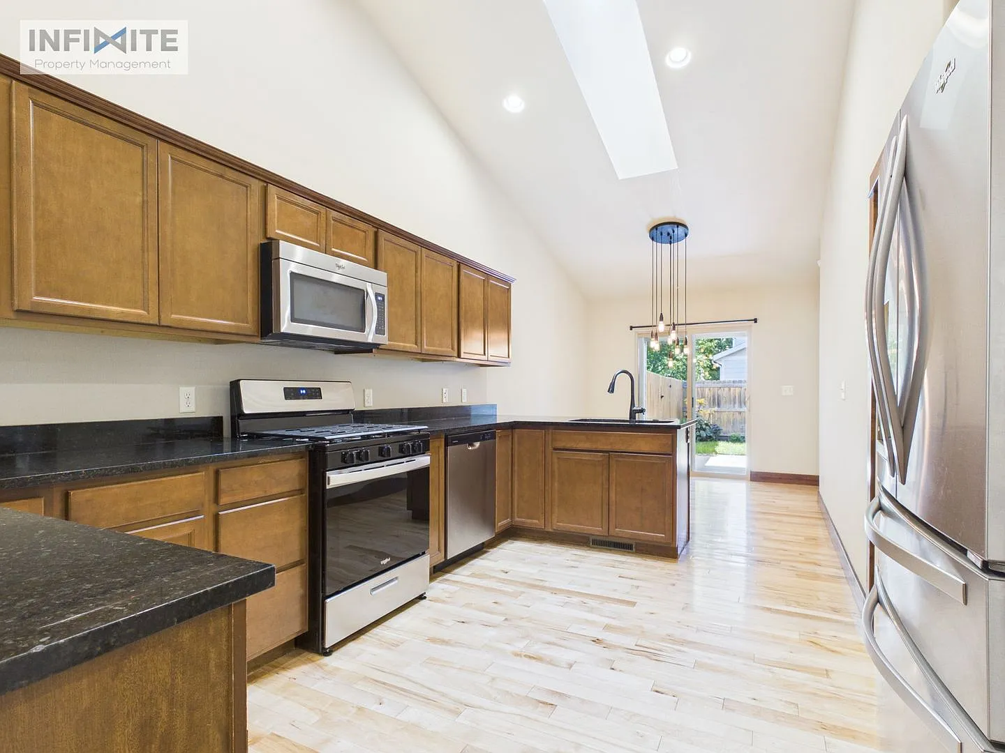 Spacious Living with a Large Fenced Yard! — Photo 4