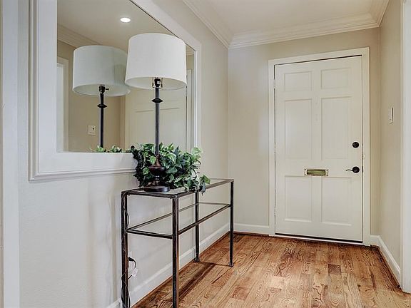 Hardwood 4 Oak Floors cover the open floor plan bringing the warmth of natural wood to the home!