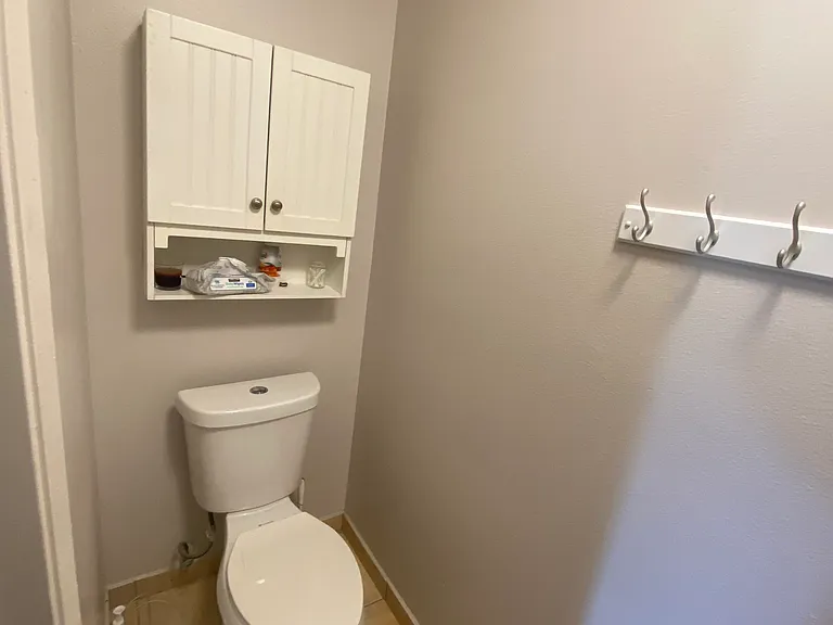 Half restroom located in the master bedroom.