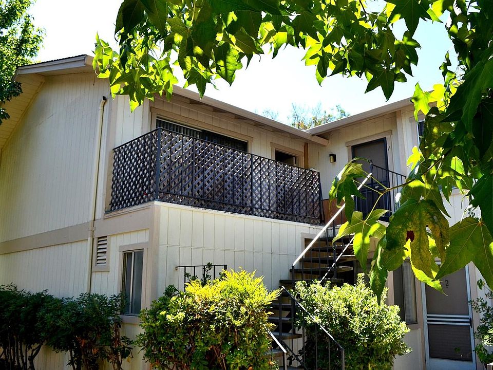 #4 is on the left at top of stairs, laundry room is below the balcony (narrow window)