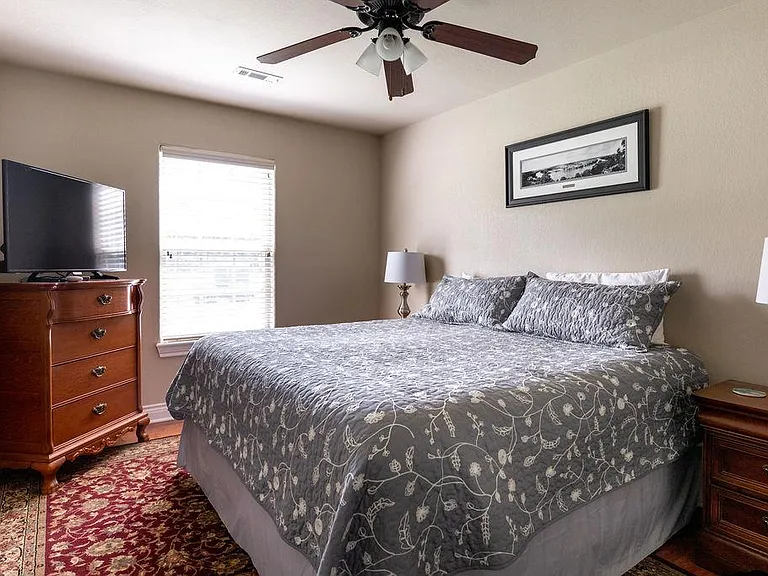 Guest bedroom 1 with king bed.
