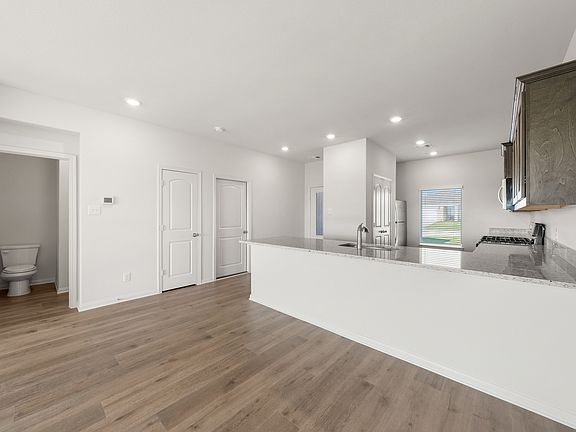 The dining room sits right off of the kitchen.