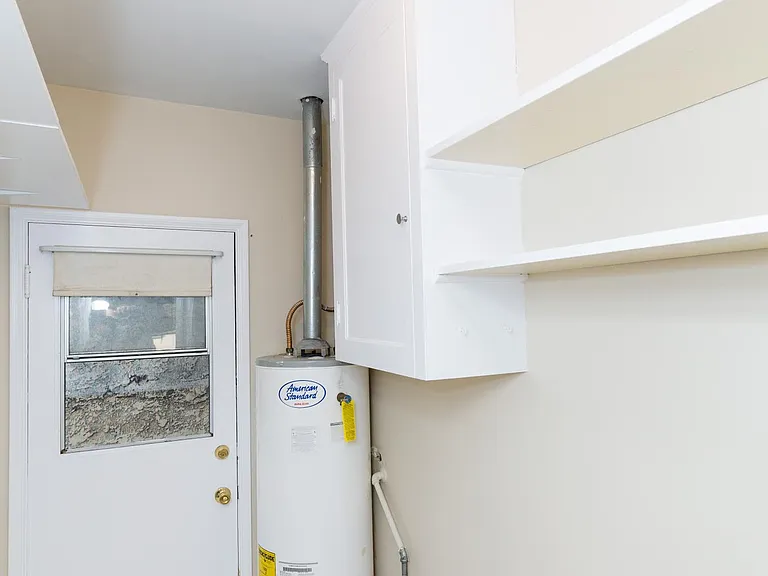 Laundry room, backdoor and tub sink